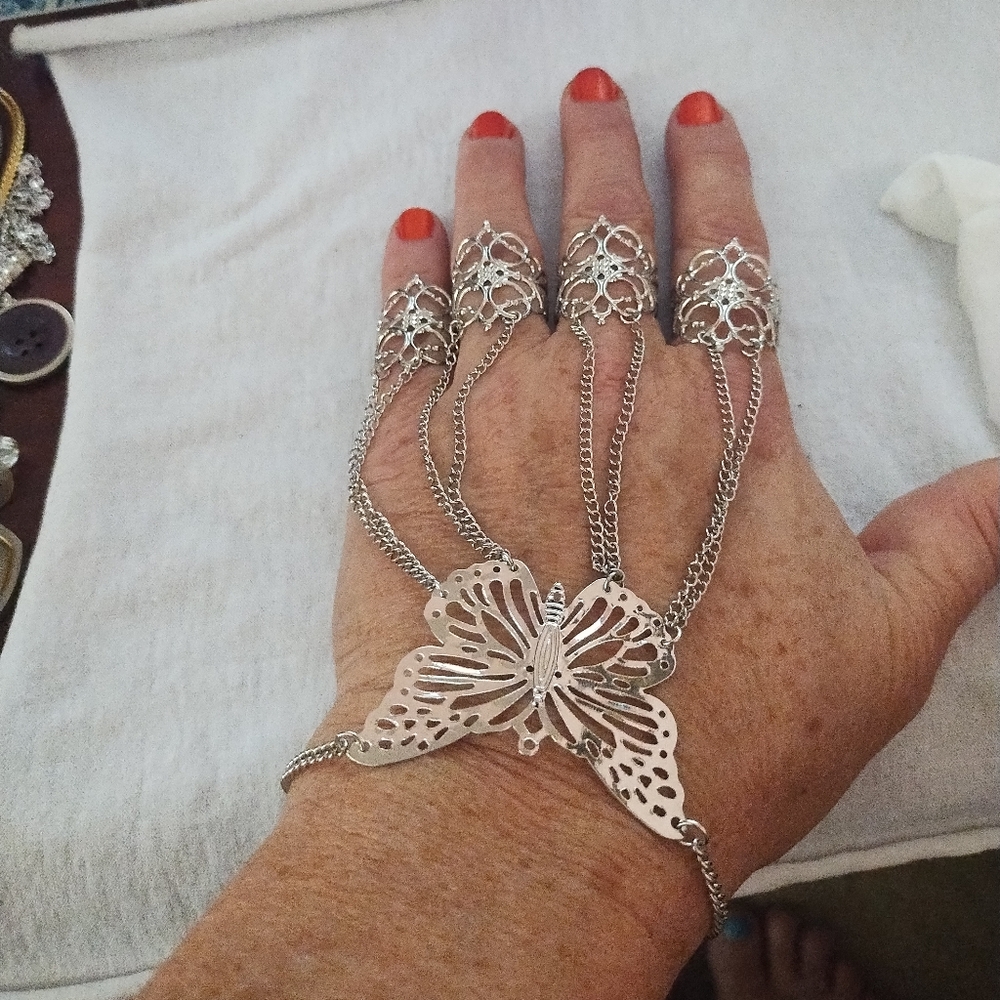Silver toned butterfly slave bracelet